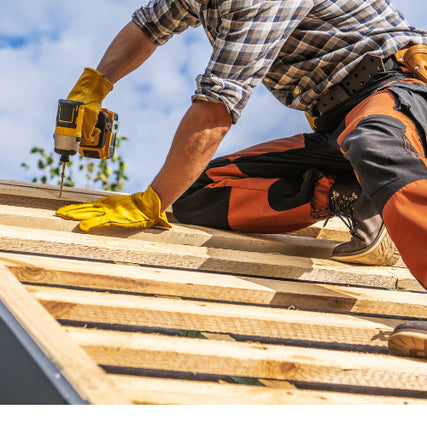 Contractor RentalsContractor using a power drill to install a roof